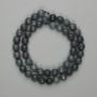 Iolith-Perlen, facettierte Kugeln, Durchmesser 8 mm ±, Länge ca. 37 cm, auf Schnur