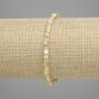 Armband aus beigem Perlmutt, facettierte Würfel 3×3 mm, Länge ca. 18 cm, elastisch