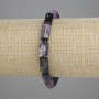 Armband aus Charoit, facettiert, Ø ca. 12–13 × 6–8 mm, Länge ca. 18 cm, elastisch
