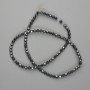 Perlen aus Hämatit, facettierte Kugeln 4×4 mm, Länge ca. 39 cm