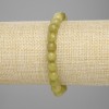 Armband Chrysolith (Olivin) – facettierte Kugeln, Durchmesser ca. 7,5 mm, Länge ca. 18 cm, Elastik-Armband