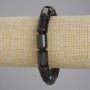 Rauchquarz-Zylinderarmband, Abmessungen 15×10 mm, Länge ca. 18 cm, elastisch