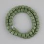 Grüne Vulkanlava-Zylinderperlen, Durchmesser 8×8 mm, Länge ca. 38 cm, auf Schnur aufgefädelt