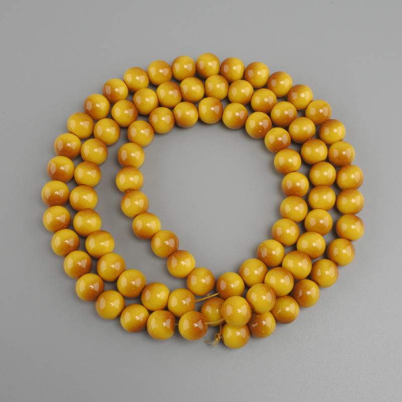 Gelbe Tigeraugen-Perlen (Einzelperlen) glatte Kugeln, Durchmesser ca. 10 mm, Länge ca. 80 cm, auf Faden