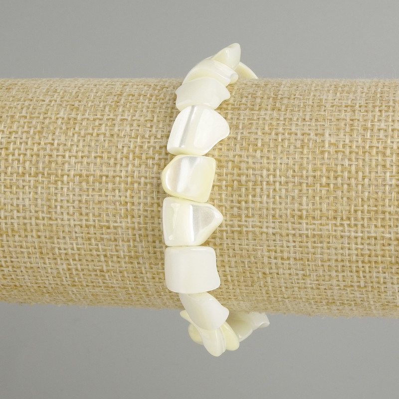 Armband aus Perlmutt, facettierte Perlen, Durchmesser 9–12×11–13 mm, Länge ca. 18 cm, elastisch