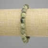 Armband Serpentin facettierte Kugeln, Durchmesser 9-10×8-9mm ±, Länge 18 cm ± Elastikband
