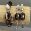 Set Armband und Ohrringe Achat, getrommelt 18x13 mm (±), Länge 64 mm (±) mit Metall-Einsätzen, Länge 18 cm (±) Stretch