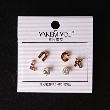 (5 mm) Ohrstecker – Kugeln, Buchstaben LUCK und Strass in Gold