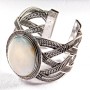 Breites Perlmuttarmband mit Metallfassung und griechischem Muster, oval geformt