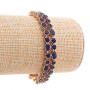 Xuping Damenarmband mit blauen Kristallen in runder und ovaler Form, Goldfarbe