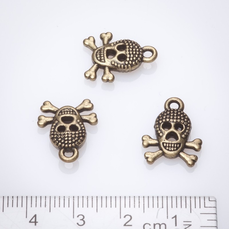 Schädelanhänger Bronze 13×17 mm, Verpackung 20 g ± 13 Stück