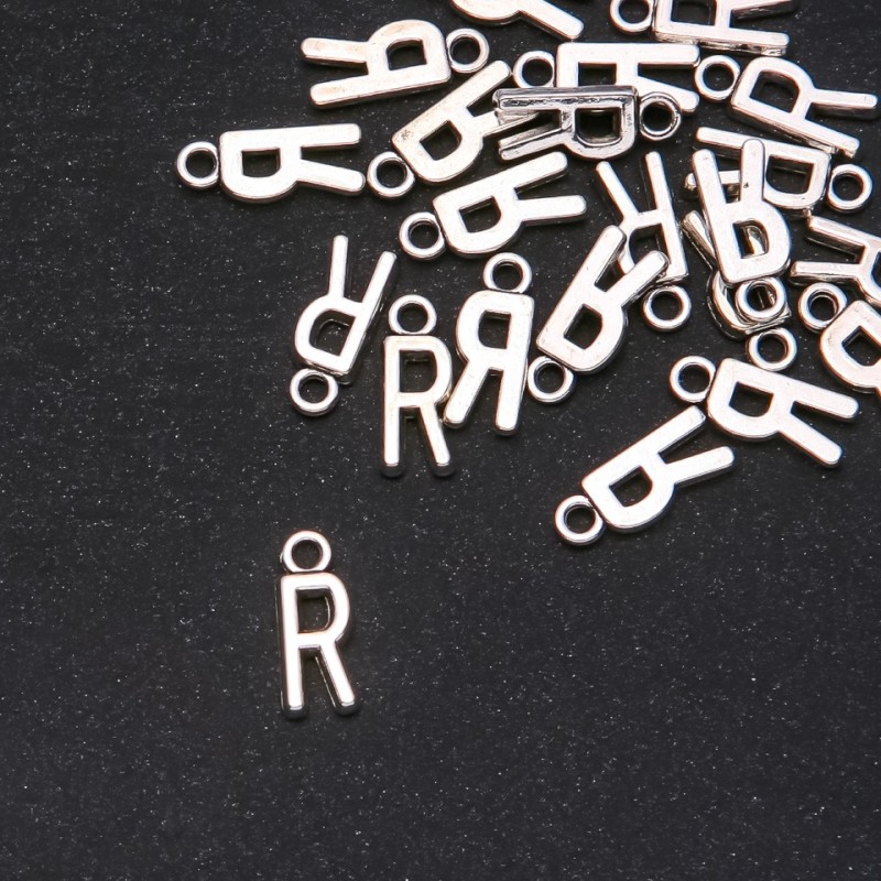 Schmuckzubehör – Anhänger Buchstabe 'R' 17×7 mm Verpackung 20 g (± 25 Stück)