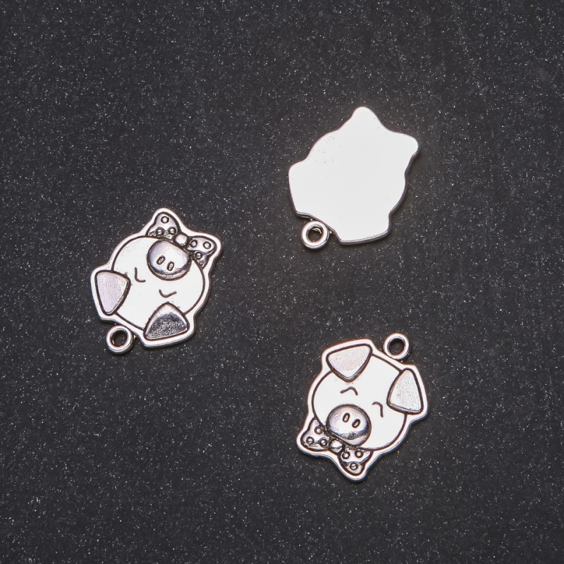 Anhänger 'Schweinchen' 16 × 20 mm, Verpackung 20 g ±9 Stück