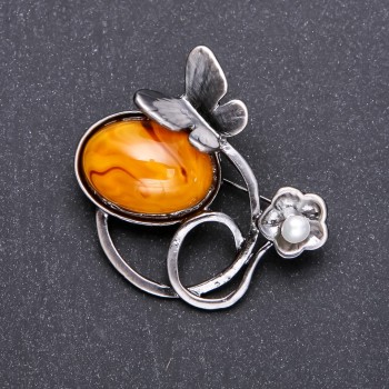 Brosche Schmetterling, geschmiedet, Bernstein, 47 × 47 mm, graues Metall