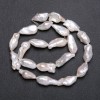 Natürliche Barockperlen auf einer Schnur, warmer petrolfarbener Schimmer, Ø 10×20 mm, Länge ca. 40 cm (±)