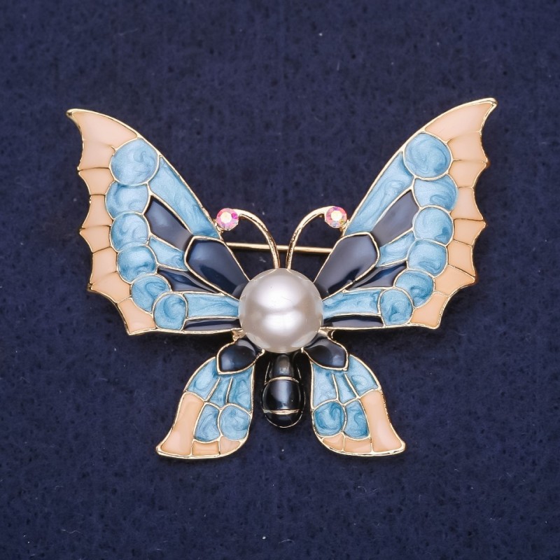Schmetterlingsbrosche mit Perle, blau und beige Emaille, 40 × 50 mm, gelbes Metall
