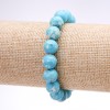 Armband aus Varizit (gepresst) hellblau, glatte Kugeln, Durchmesser 10 mm, Länge 18 cm, auf elastischem Band