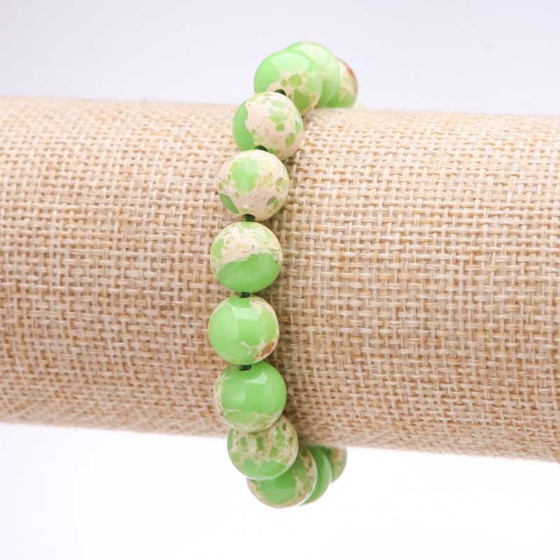 Armband aus Varizit (gepresst) Salatgrün, glatte Kugeln, Durchmesser 10 mm, Länge 18 cm, auf Gummiband