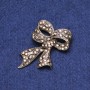 Sale! Brosche Schleife mit Strasssteinen aus goldfarbenem Metall 35×53 mm