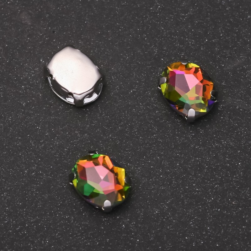 Preis pro Packung / 10 Stück. Aufgenähter Kristall in Krappenfassung, oval 8x10 mm, rosa-grün