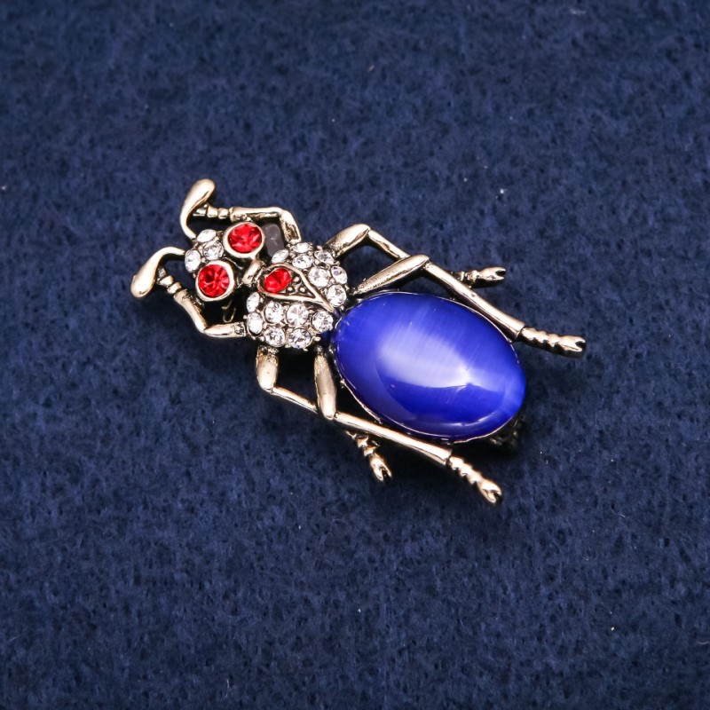 Brosche Käfer mit Cabochon Katzenauge und Strass, goldfarbenes Metall, 23×40 mm