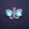 Sonderangebot! Brosche Schmetterling mit blauen Kristallen, silbernes Metall 26×38 mm