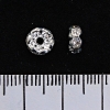 Rondell-Abstandshalter mit weißen Strasssteinen, silberfarbener Metallton, 6 mm, 100 Stk./Packung