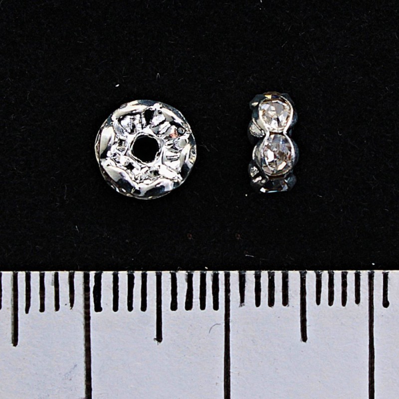 Rondell-Abstandshalter mit weißen Strasssteinen, silberfarbener Metallton, 6 mm, 100 Stk./Packung