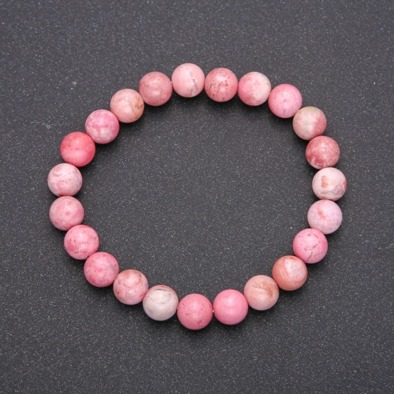 Armband aus Rhodochrosit, auf elastischem Gummiband, glatte Kugeln, Ø ca. 10 mm, Länge 18 cm