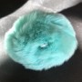 Schlüsselanhänger-Pompon aus Naturfell, türkis