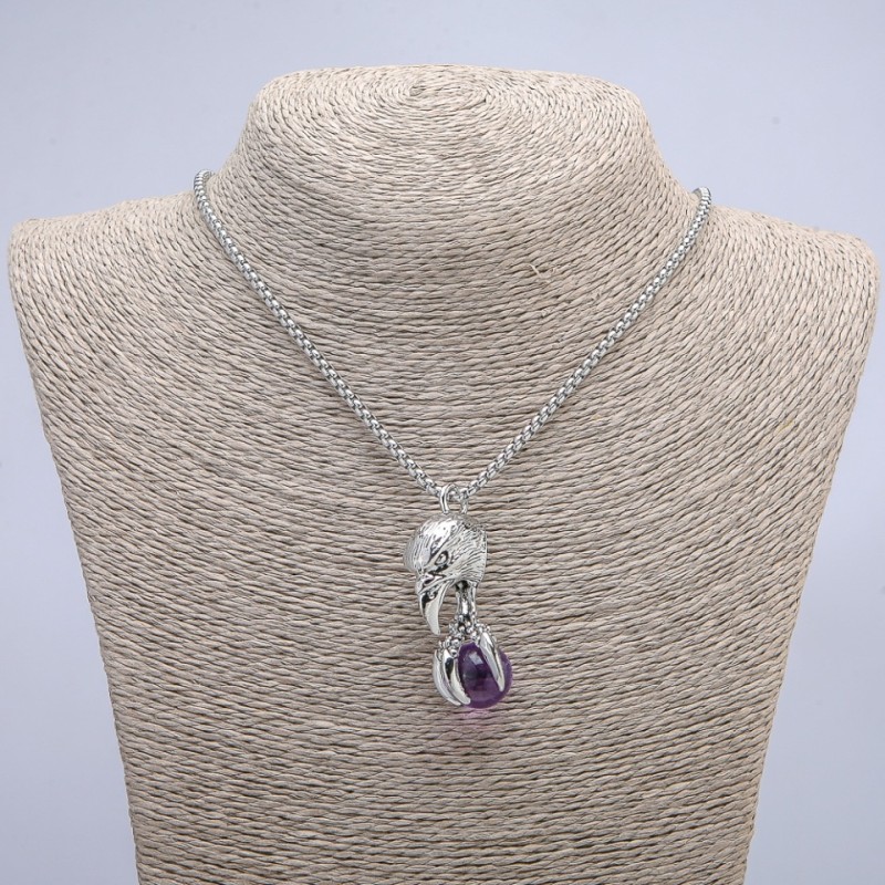 Anhänger "Vogel mit Kugel" 47x18 mm an einer Kette, Länge ca. 70 cm, silberfarbenes Metall