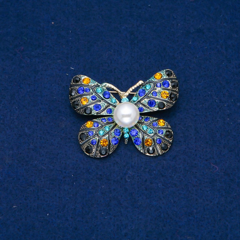 Sale! Brosche Schmetterling aus goldfarbenem Metall, gelbe, blaue und schwarze Strasssteine und eine Perle 32×42 mm +