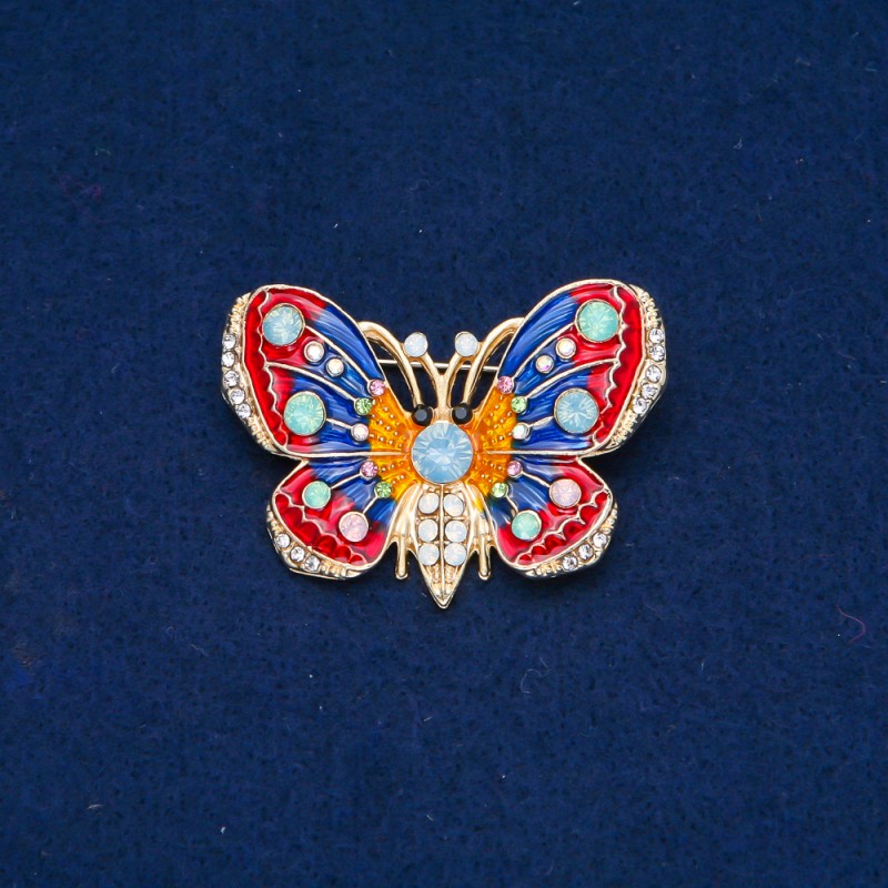 Ausverkauf! Brosche Schmetterling aus goldfarbenem Metall, Emaille und Strasssteinen in Weiß, Blau, hellgrün und Rosa 30 × 45 mm +