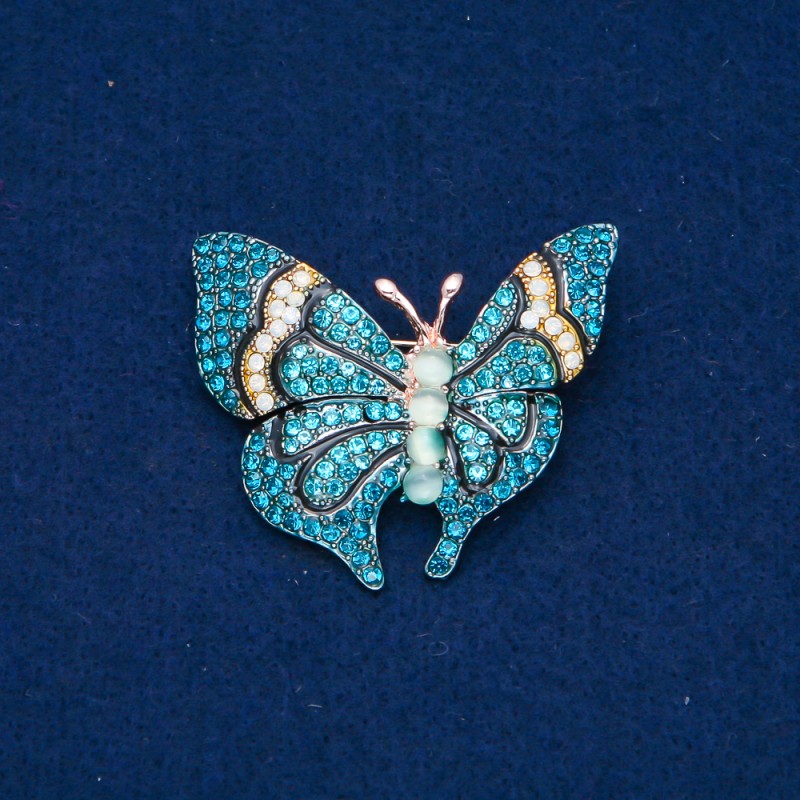 Ausverkauf! Schmetterlingsbrosche aus goldfarbenem Metall, blaue und weiße Strasssteine und Perlen 37×45 mm +