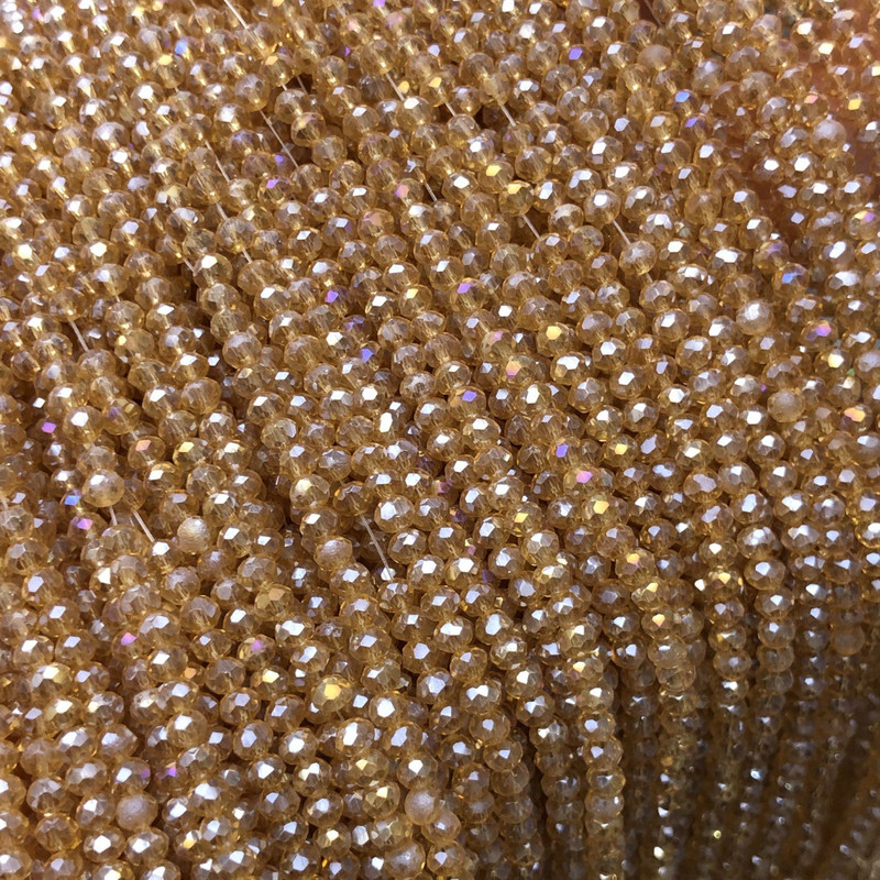 Perlen aus tschechischem Kristall auf Faden, orange-pfirsich-transparent, mit Benzin-Schimmer, facettiertes Rondell, Durchmesser 3 x 2,5 mm, Länge 36 cm + -