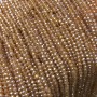 Perlen aus tschechischem Kristall auf Faden, orange-pfirsich-transparent, mit Benzin-Schimmer, facettiertes Rondell, Durchmesser 3 x 2,5 mm, Länge 36 cm + -