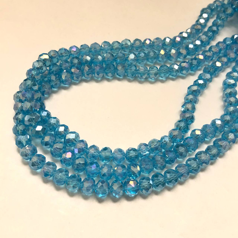 Perlen aus tschechischem Kristall auf Faden, blau-transparent, facettiertes Rondell, Durchmesser 6 x 4,5 mm, Länge 38–40 cm +