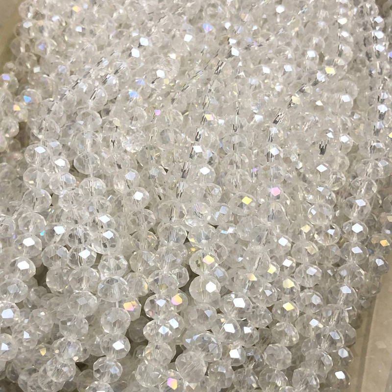Perlen aus tschechischem Kristall auf Faden, weiß-transparent mit petrolfarbener Tönung, facettiertes Rondell, Durchmesser 6×4,5 mm, Länge 38–40 cm +