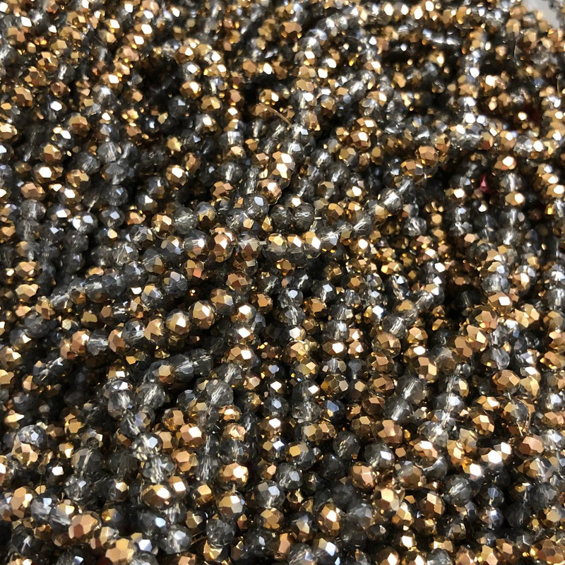 Perlen aus tschechischem Kristall auf Faden – assortiert, grau-transparent + goldfarbene Beschichtung, facettierte Rondelle, Durchmesser 3,5 x 3 mm, Länge 36-3