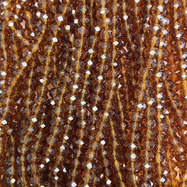 Perlen aus tschechischem Kristall auf Schnur – braun-transparentes facettiertes Rondell, Durchmesser ca. 6×5 mm, Länge ca. 40–42 cm