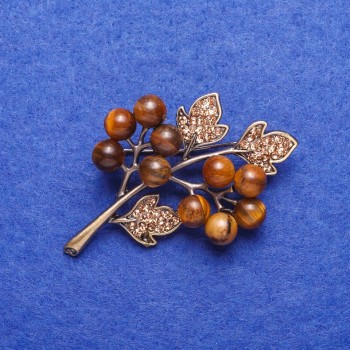 Brosche aus Tigerauge Naturstein 'Zweig' silberfarben 4 × 3,5 cm