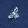 Schmetterling-Brosche, Katzenauge, blaue Strasssteine, silberfarbenes Metall 40x20 mm +