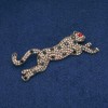 Leopard-Brosche mit goldfarbenen und schwarzen Strasssteinen, goldfarbenes Metall 78 x 30 mm +