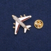 Brosche „Flugzeug“ 27×30 mm, brauner Streifen, Metallfarbe Gold