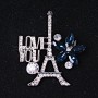Brosche «Paris» aus silbernem Metall, Strasssteine und blaue Kristalle, 40 × 35 mm +