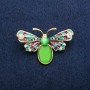 Brosche Schmetterling mit farbiger Emaille, weißen Kristallen und grünem Katzenauge, goldfarbenem Metall 27×42 mm