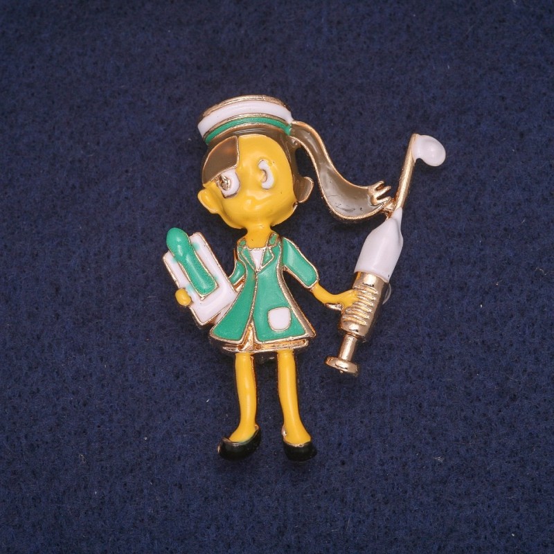 Brosche 'Krankenschwester' Emaille, goldfarbenes Metall 38×46 mm