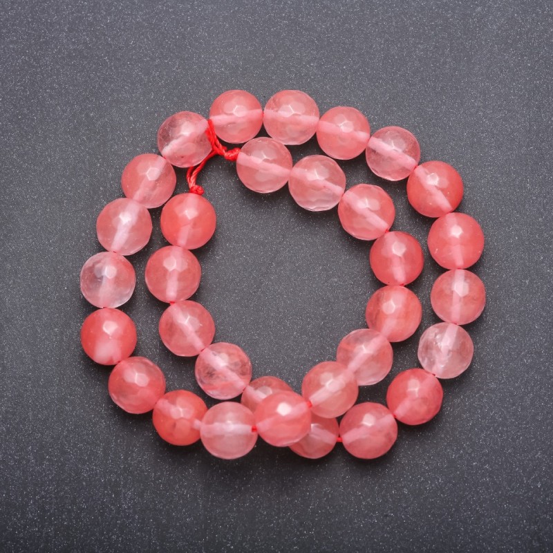 Rosa Chalzedon-Perlen auf einer Schnur, facettierte Kugeln, Durchmesser ca. 12 mm, Länge 37 cm