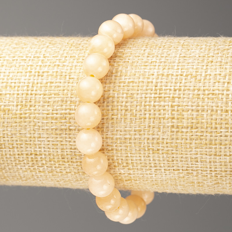 Armband Selenit (künstliches Acryl), Durchmesser der Kugeln ca. 8 mm, Länge ca. 18 cm, glatte Kugeln auf Elastikband