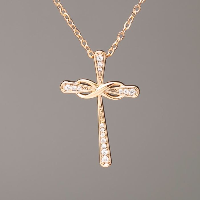 Kette Xuping Vergoldung mit Anhänger 'Kreuz', Abmessungen 29 x 19,5 mm ± (weiße Strasssteine), Länge 41-47 cm ±